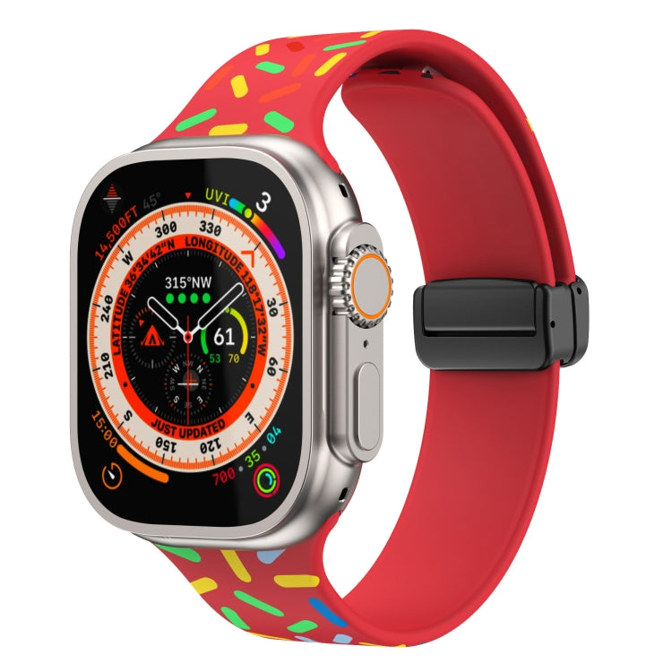 Silicone Apple Watch band with rainbow dots, red strap, black magnetic buckle clasp