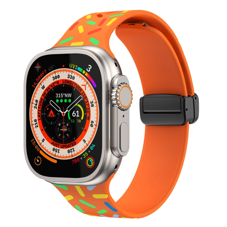 Silicone watch band with rainbow dot print, orange strap and magnetic buckle