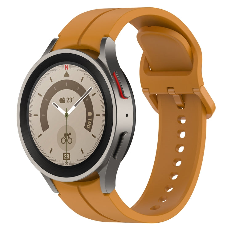 Grooved silicone watch band with buckle, amber orange