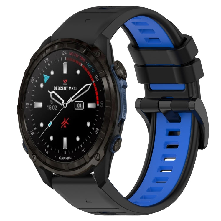 Two-color silicone watch band, black outer band with blue inner strap and buckle.