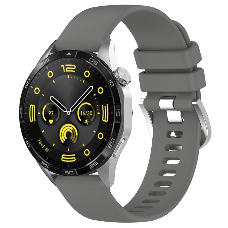 Silicone watch band with silver buckle, dark gray glossy finish, vented strap holes.