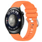 Glossy silicone watch band with silver buckle, bright orange strap with pin holes