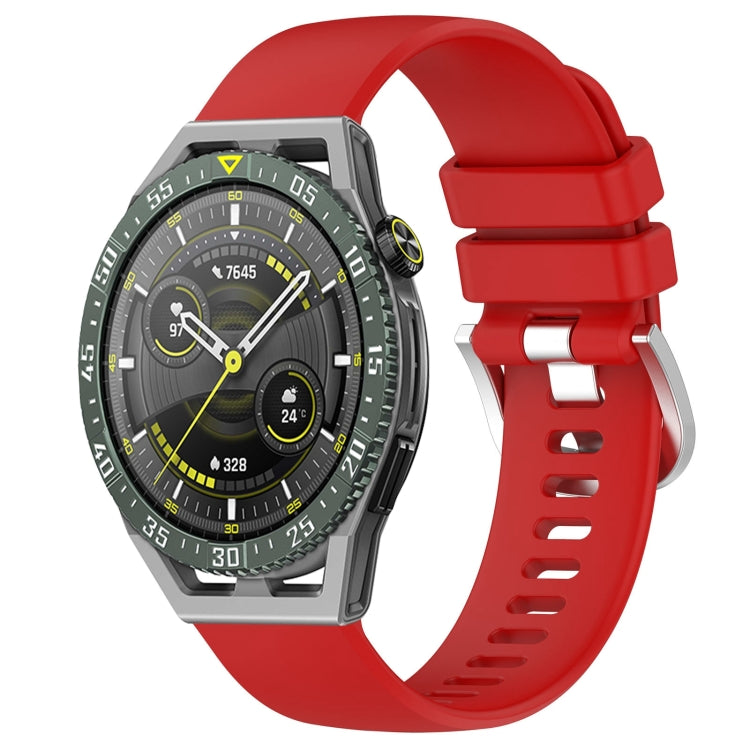 Glossy silicone watch band with silver buckle clasp, red strap with pin holes