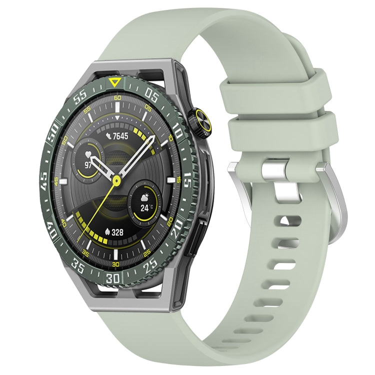 Glossy silicone watch band with silver buckle, mint green perforated strap