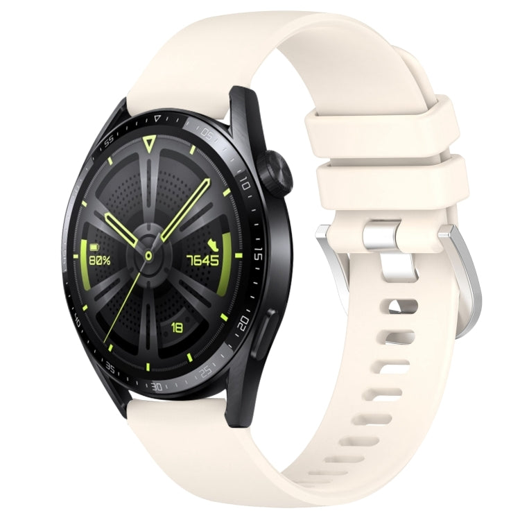 Glossy white silicone watch band with silver buckle, punched holes, curved ends.