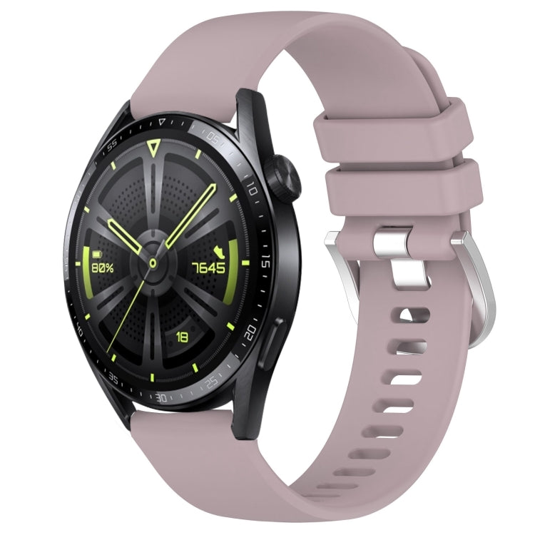 Glossy mauve/purple silicone watch band with silver buckle, punched holes, curved ends.