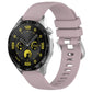 Silicone watch band with silver buckle, mauve glossy finish, vented strap holes.