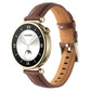 Dark brown leather watch band with thread pin buckle and stitched perforations