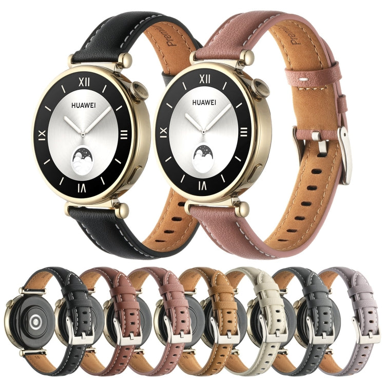 Set of leather watch bands in black, tan, brown, and pink with pin buckles