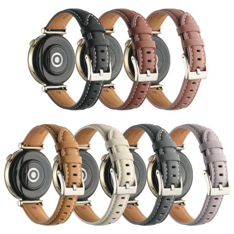 Set of leather watch bands in dark, tan, beige, and grey with pin buckles