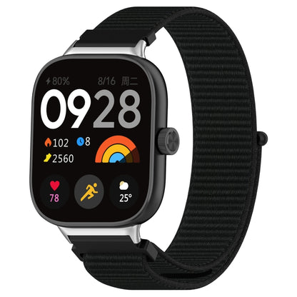 Nylon loop watch band with metal connector, black woven fabric, on smartwatch