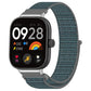 Nylon loop watch band with metal connector, teal woven fabric, on smartwatch