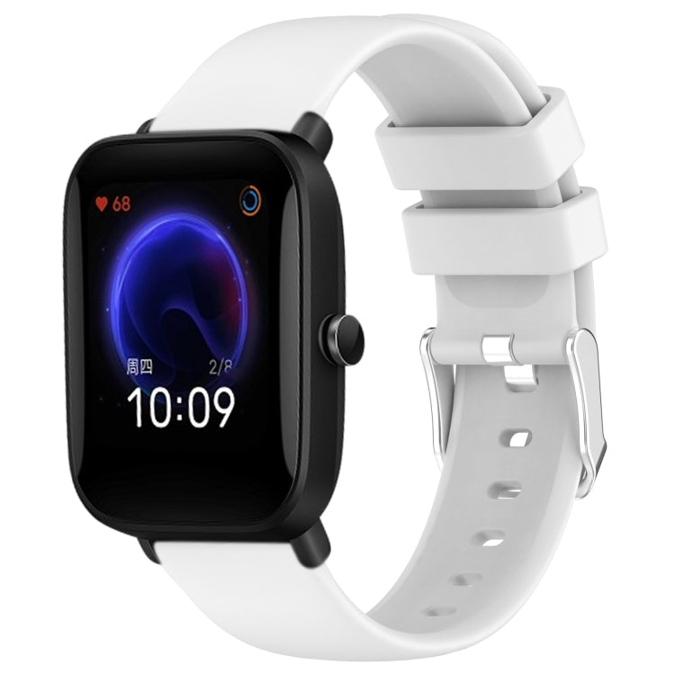 White silicone watch band with three-hole strap and metal buckle adapter