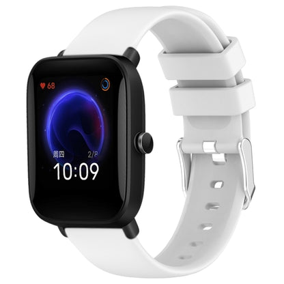 White silicone watch band with three-hole strap and metal buckle adapter