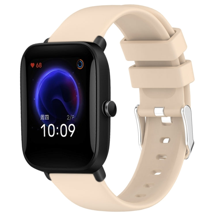 Beige silicone watch band with three-hole strap and metal buckle adapter