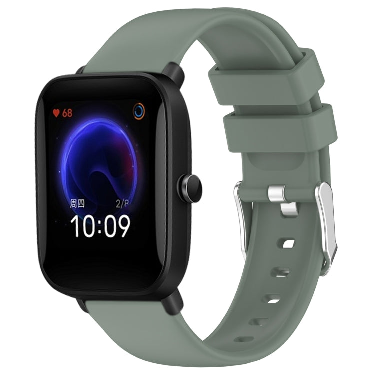 Olive green silicone watch band with three-hole strap and metal buckle adapter