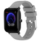 Light gray silicone watch band with adjustable holes and metal clasp.