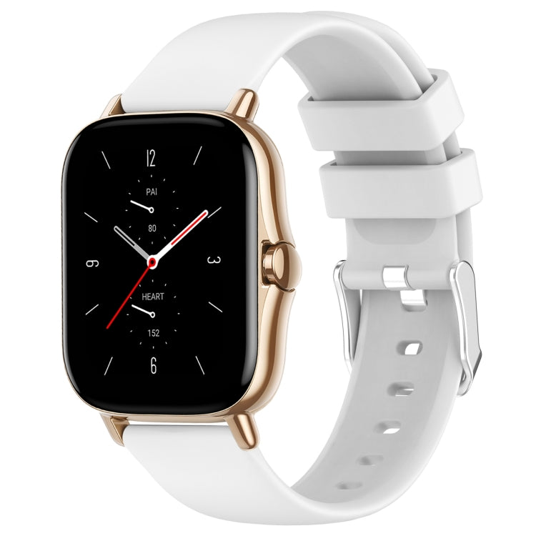 White silicone watch band with adjustable holes and metal clasp.