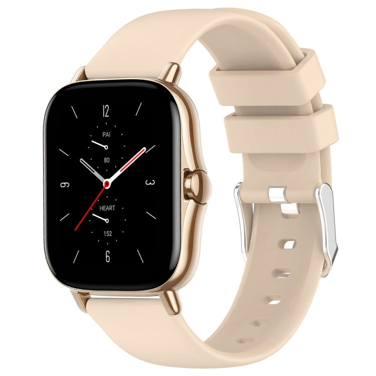 Beige silicone watch band with adjustable holes and metal clasp.