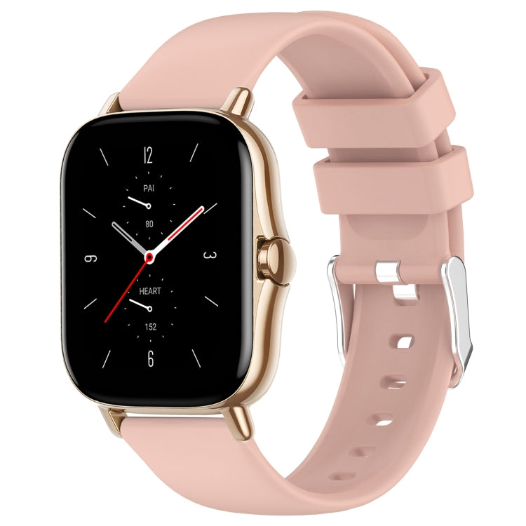 Light pink silicone watch band with adjustable holes and metal clasp.