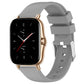 Gray silicone watch band with three-hole strap and metal buckle adapter