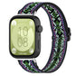 Floral-pattern elastic nylon watch band in green, blue, and pink, attached to a smartwatch.