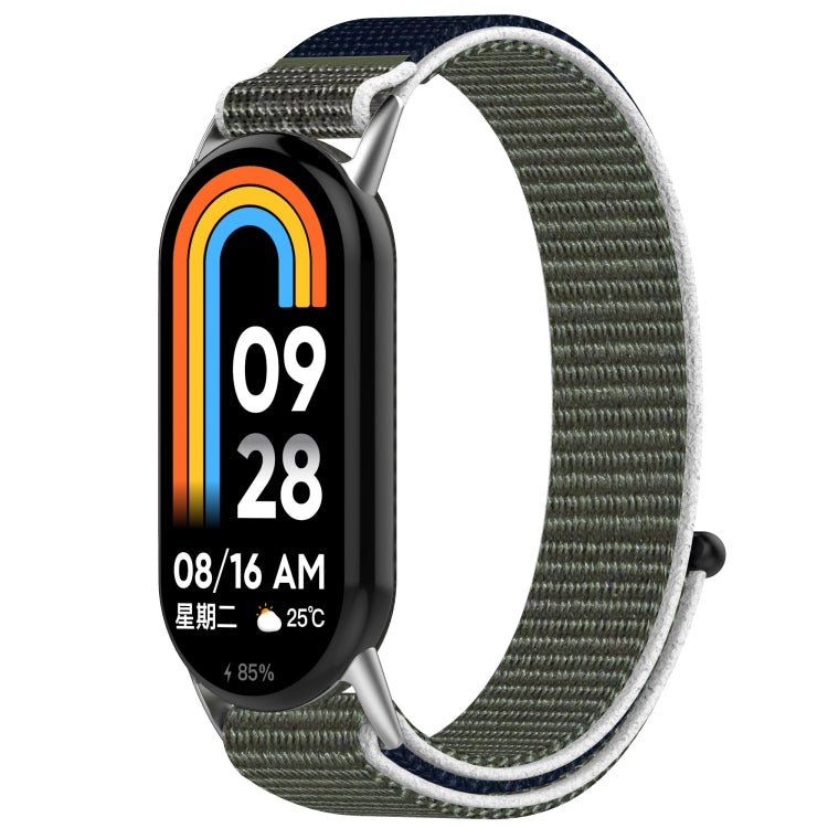 Olive gray nylon hook-and-loop watch band with light gray edging, shown on a fitness tracker.