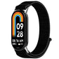Black nylon hook-and-loop watch band shown on a fitness tracker.
