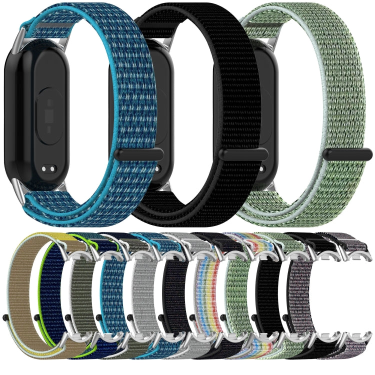 Nylon hook-and-loop watch bands in assorted colors, shown from the back and arranged together