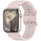 Sandy pink silicone watch band with wavy ridges, shown attached to a smartwatch