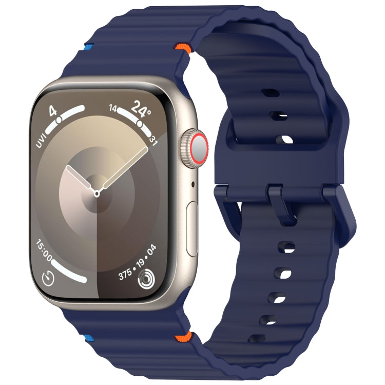 Navy blue wavy-grain silicone watch band with stitched-style ridges, shown on a smartwatch.