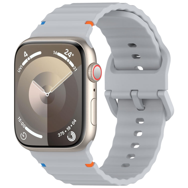 Gray wavy-grain silicone watch band with stitched-style ridges, shown on a smartwatch.