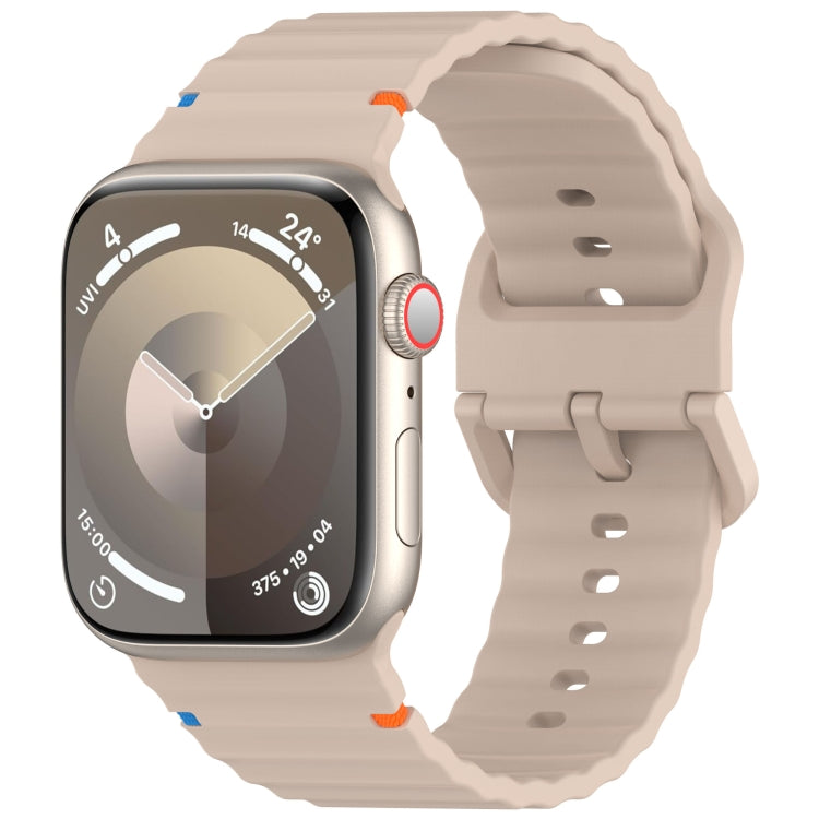 Beige wavy-grain silicone watch band with stitched edges, shown on a smartwatch