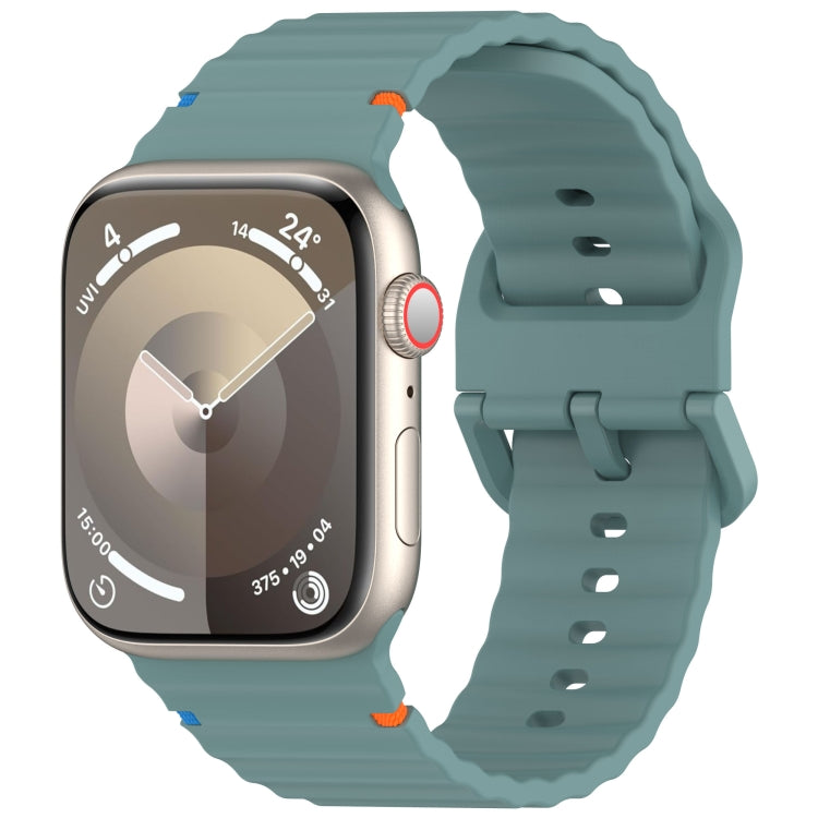 Apple Watch with a teal wavy-grain silicone band and stitched edges