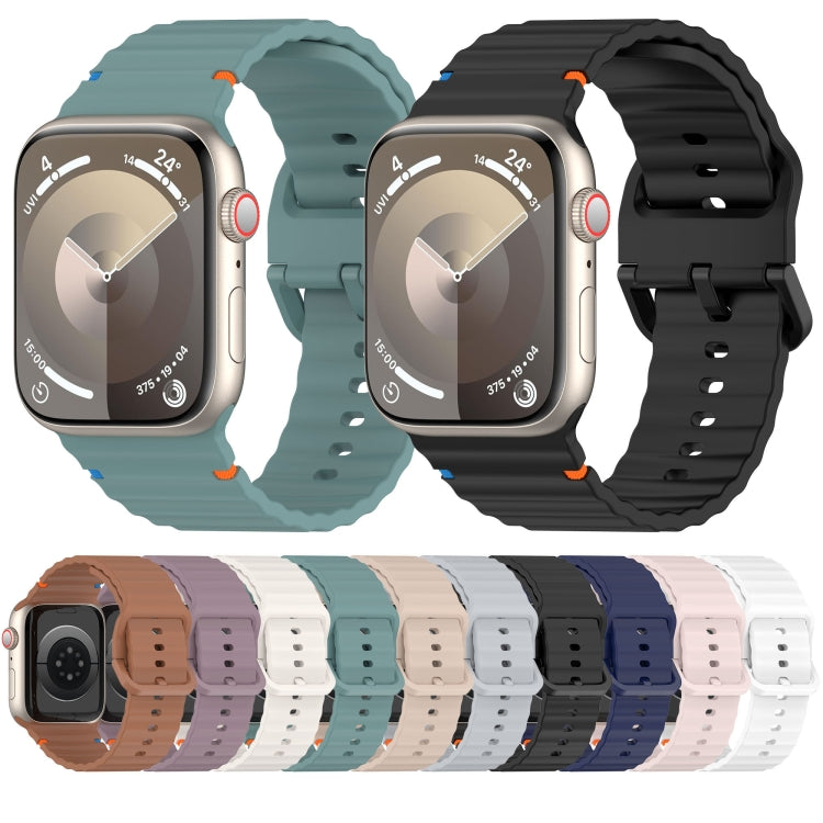 Wavy-grain silicone watch bands in teal and black, with stitched accents and a color lineup.