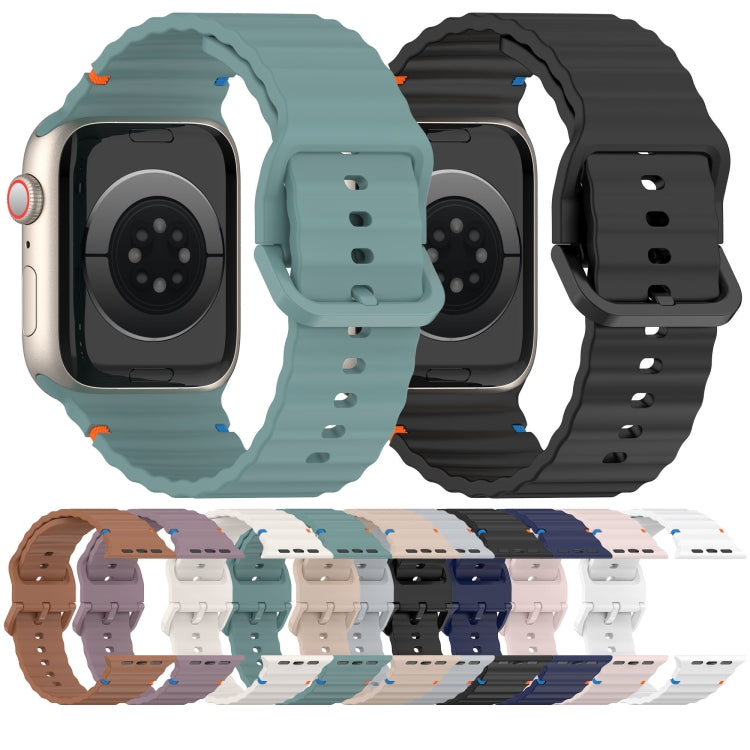 Back view of teal and black wavy-grain silicone watch bands, with a color lineup.