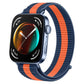 Nylon loop watch band in navy with orange stripe, shown attached to a smartwatch