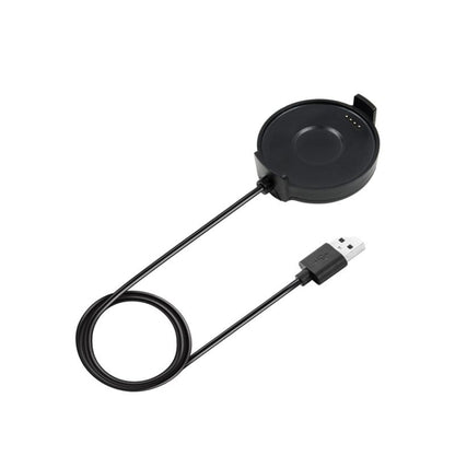 Black magnetic charging puck with USB cable for smartwatch charging