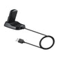 Magnetic smartwatch charging dock with black cradle and cable, angled view