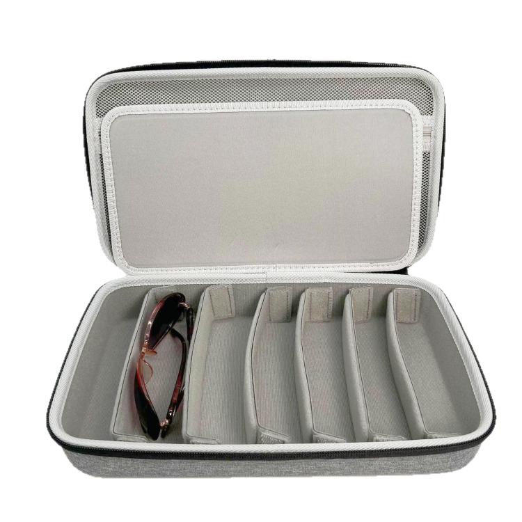Gray eyeglass storage case open with molded divider slots and eyeglasses
