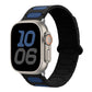 Oval magnetic silicone watch band in black with blue accents, shown on a smartwatch