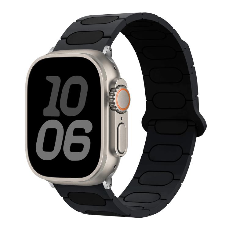 Oval magnetic silicone watch band in black with dark gray accents, shown on a smartwatch