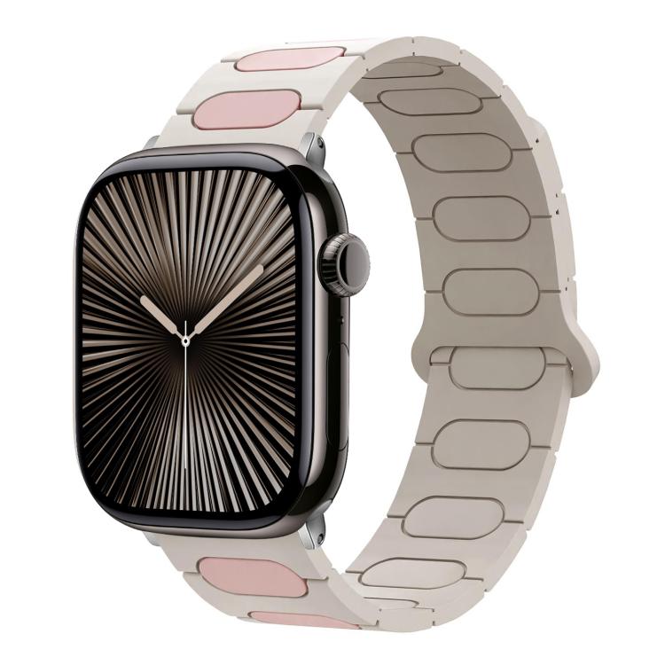 Light gray silicone watch band with pale pink oval insets on an Apple Watch.