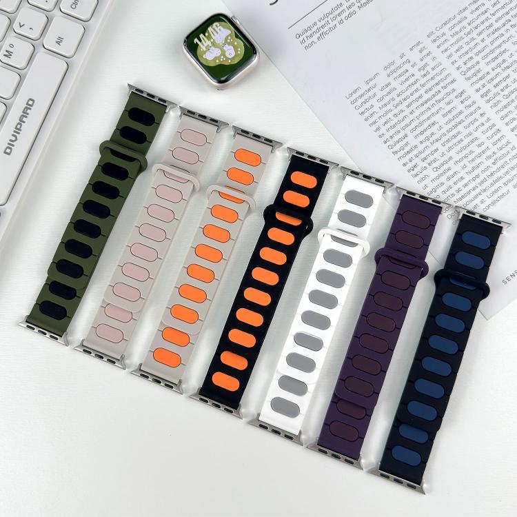 Seven silicone magnetic watch bands in assorted colors with contrasting oval insets.