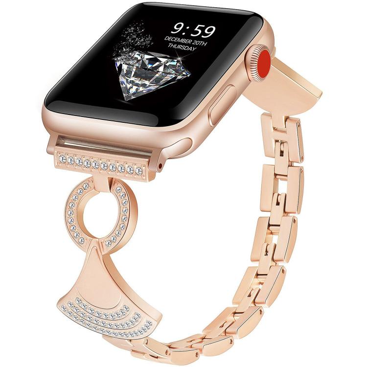 Rose gold linked metal Apple Watch band with crystal accents on its ornamental clasp