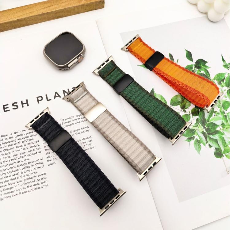 Braided nylon Apple Watch bands in dark, green, light, and orange with magnetic buckles