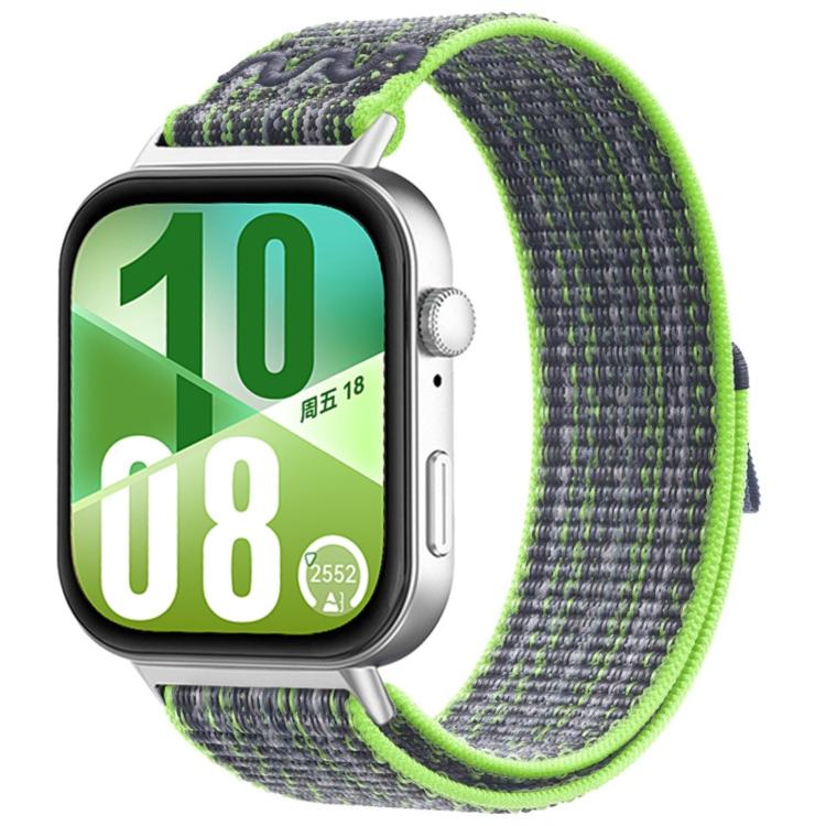 Woven watch band with a dark gray body and bright green trim, shown on a smartwatch