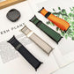 Braided nylon watch bands in dark gray, light gray, green, and orange with magnetic buckles