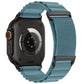 Apple Watch nylon loop band in blue gray with black hardware and a two-section design