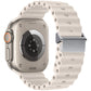 White silicone watch band and the back of a compatible watch, showing the magnetic buckle